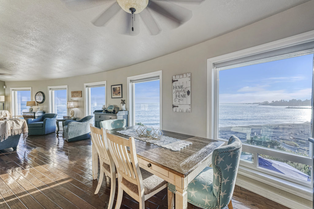 Photo of dining area with upscale furnishings overlooking the ocean - Day Dreamin'