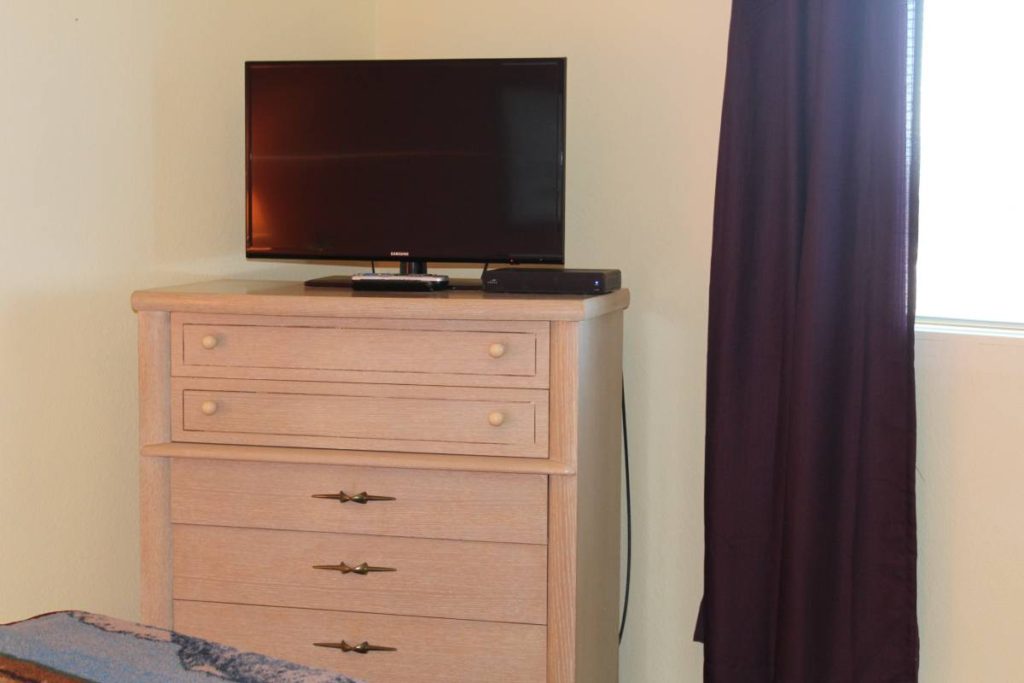 Photo of dresser with TV at Brookings Sea Haven