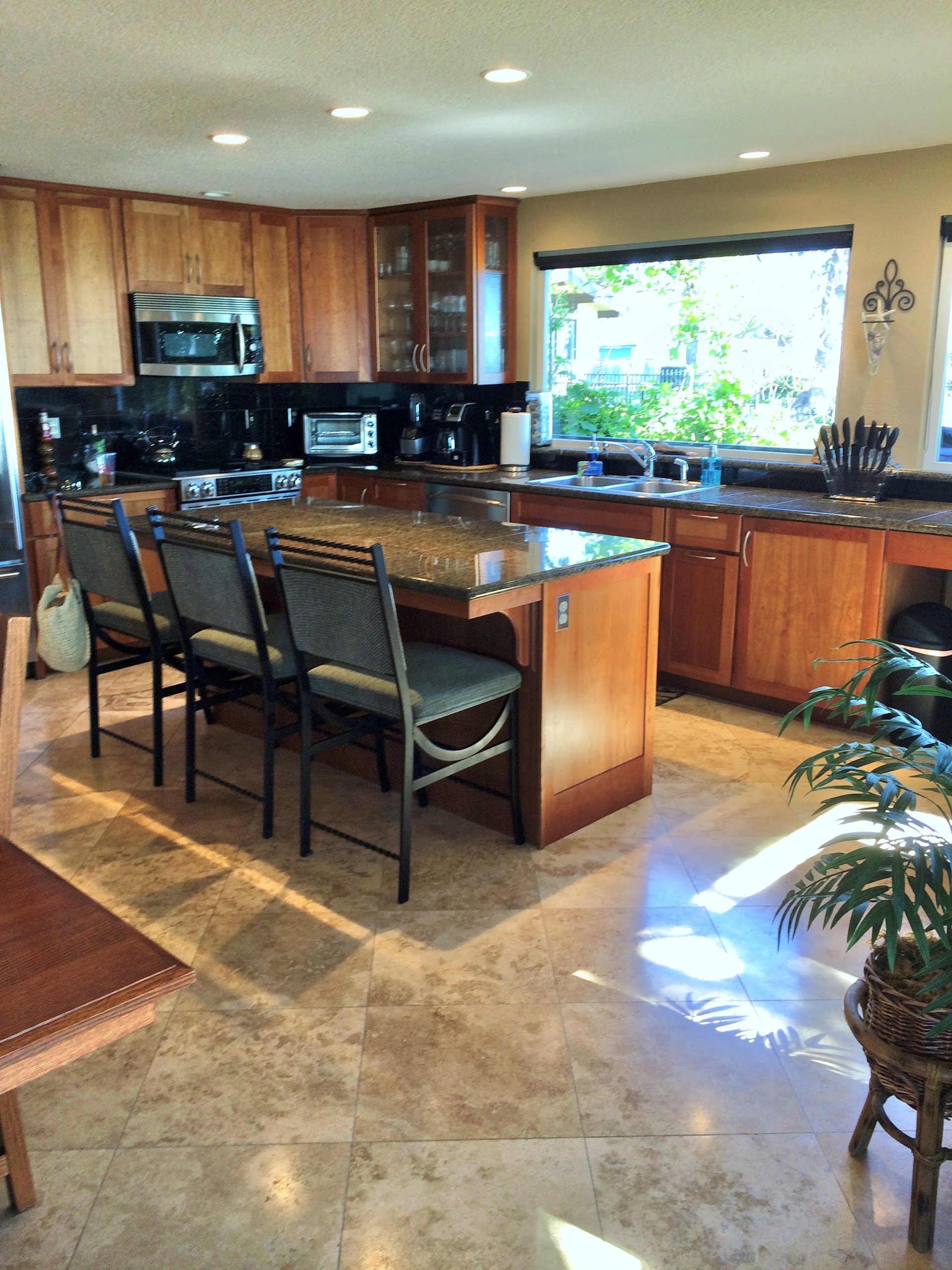 Photo of open floor plan kitchen with island seating at pacific Edge