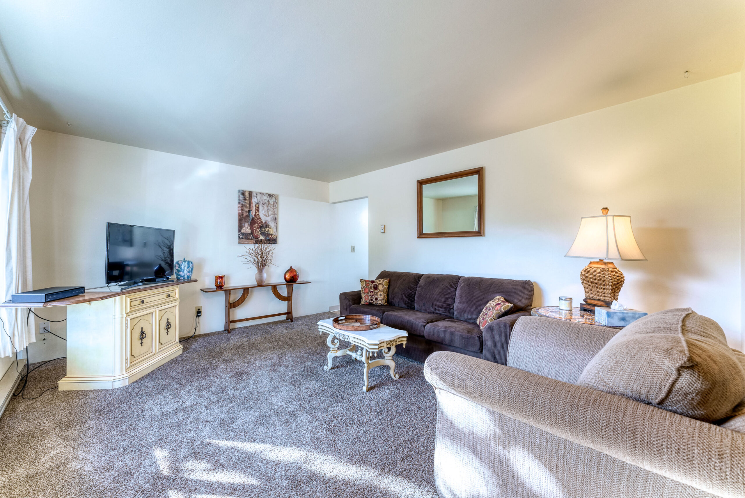 Photo of bright and sunny room with comfy furniture at Coastal Cozy Townhome