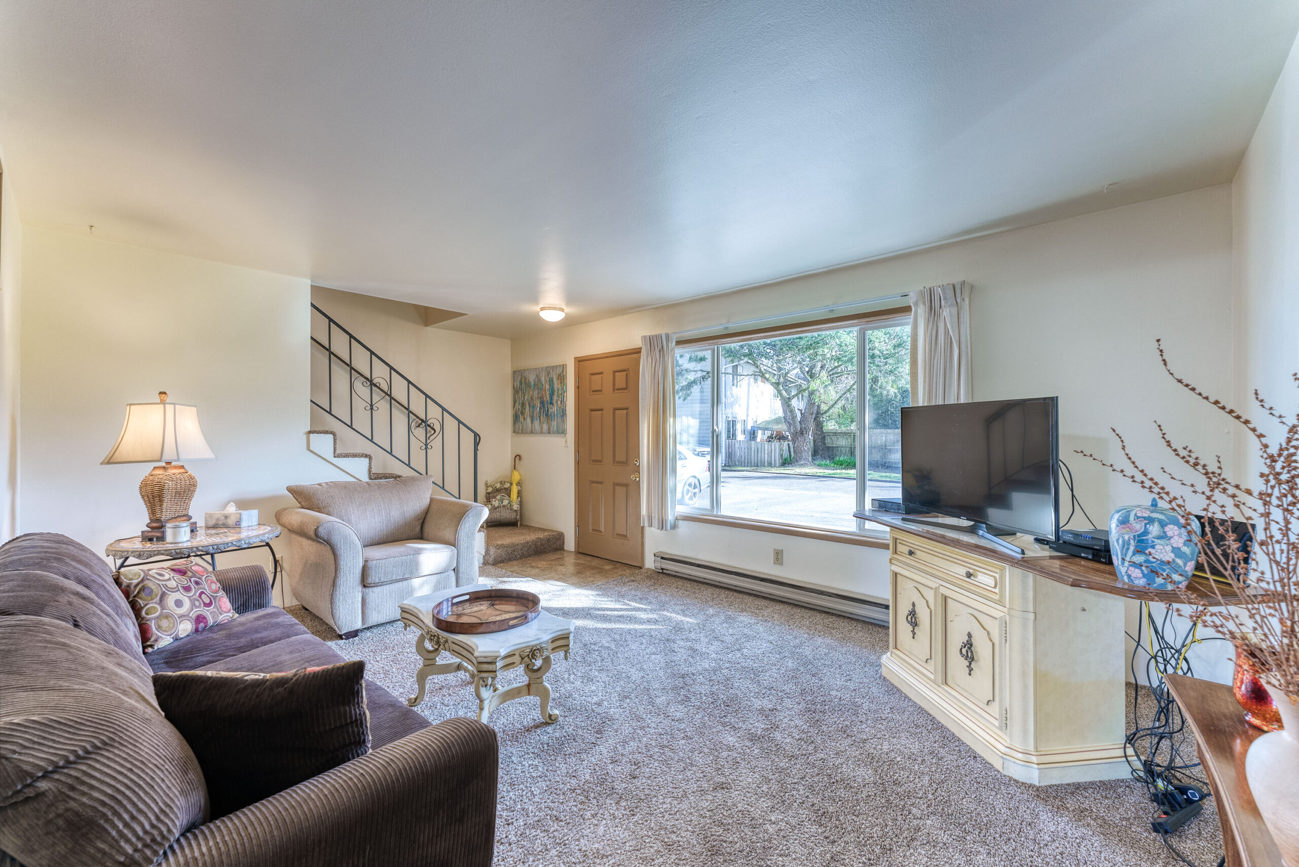 Photo of bright and sunny room with comfy furniture at Coastal Cozy Townhome