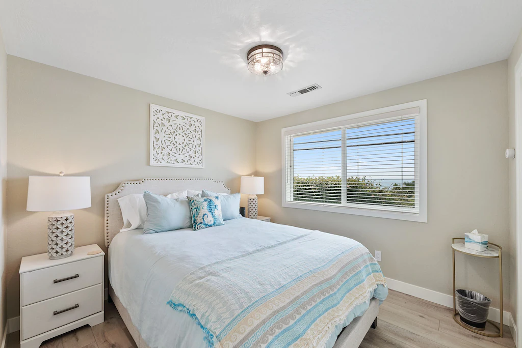 Bedroom with queen bed at Harris Beach Overlook, a Brookings Vacation Rental