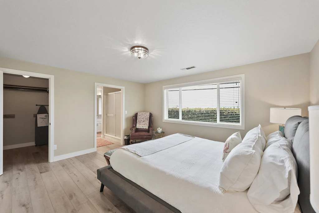 Main bedroom & bathroom at Harris Beach Overlook, a Brookings Vacation Rental