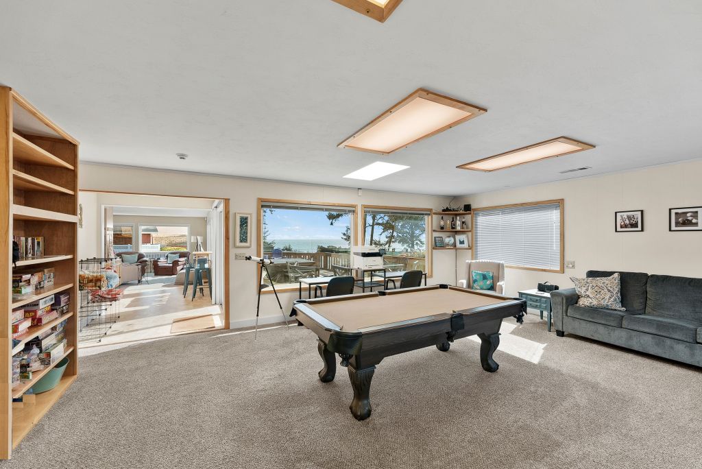Photo of Game Room and access to the rest of the home - all with ocean views