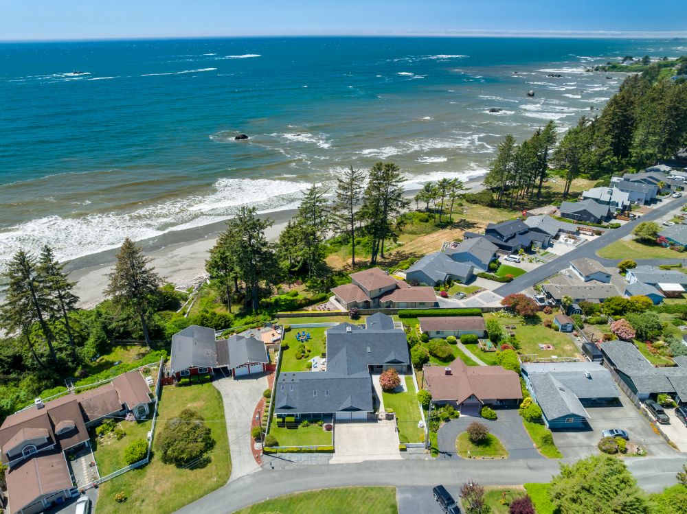 Aerial looking at Paradise Found (blue chairs) and proximity to ocean