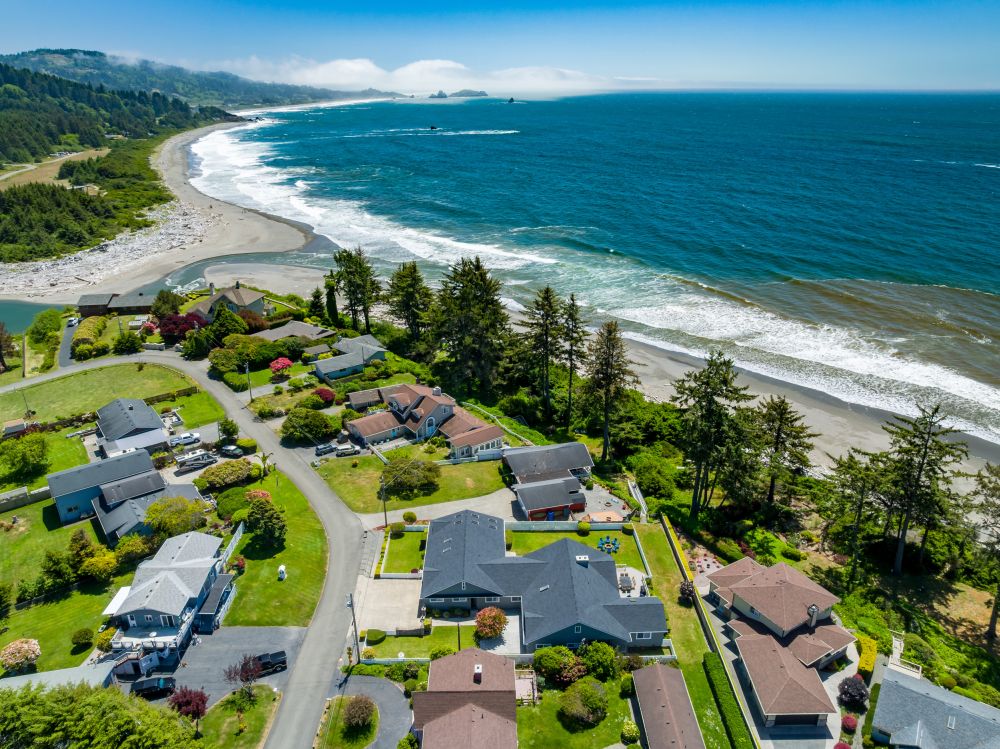 Aerial looking at Paradise Found (blue chairs) and proximity to river & ocean