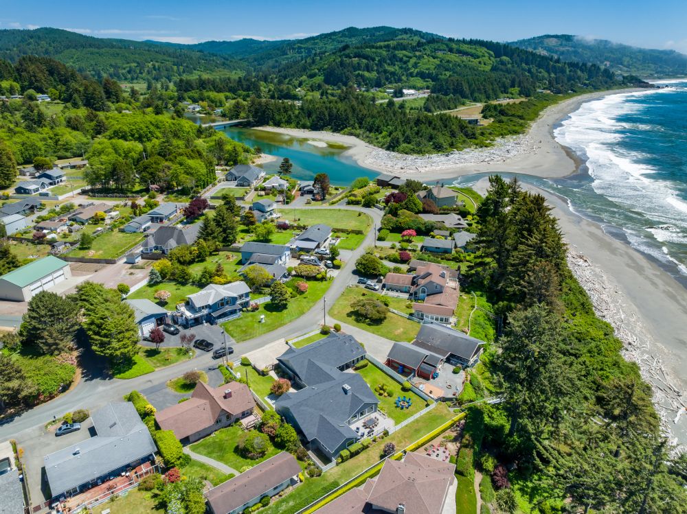 Aerial looking at Paradise Found (blue chairs) and proximity to river & ocean