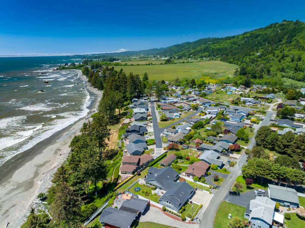 Aerial looking at Paradise Found (blue chairs) and proximity to ocean