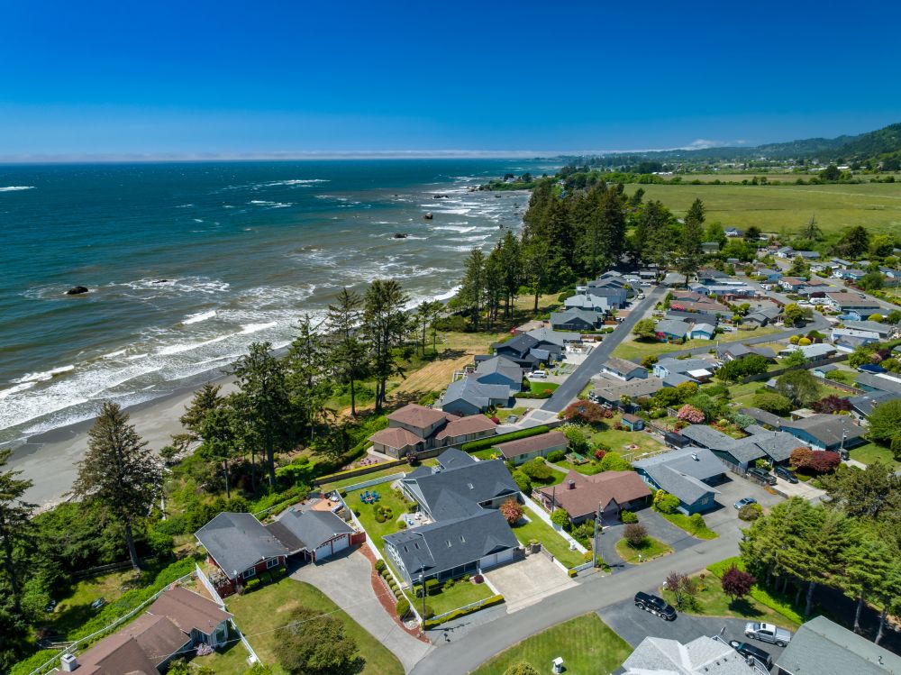 Aerial looking at Paradise Found (blue chairs) and proximity to ocean