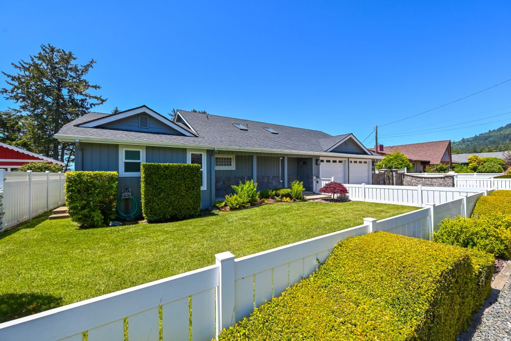 A photo of the garage & entry gate to walk into Paradise Found