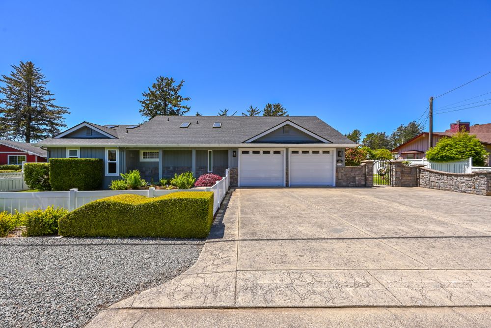 A photo of the garage & entry gate to walk into Paradise Found