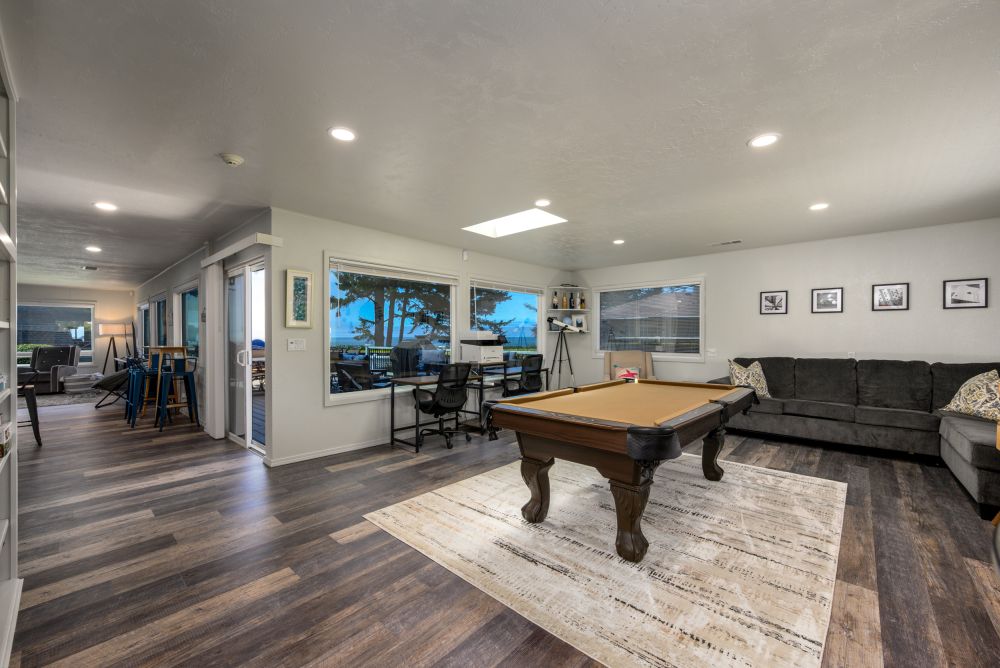 Photo of Game Room and access to the rest of the home - all with ocean views