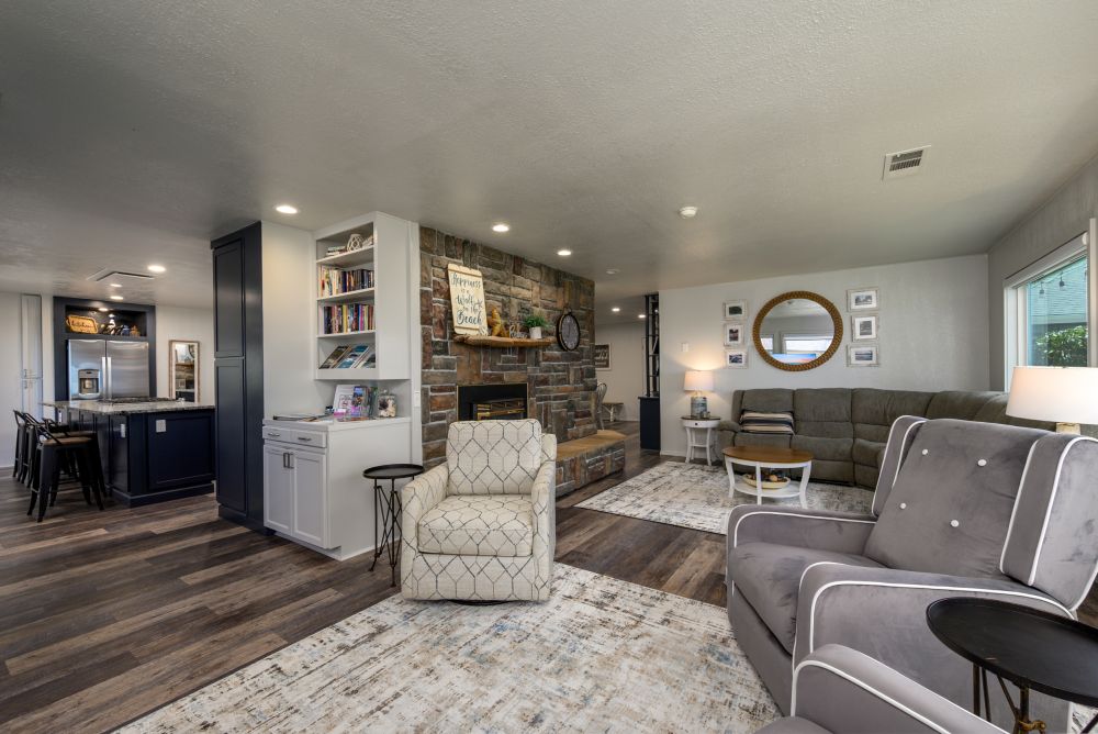 A photo of the great room leading into the kitchen and gameroom