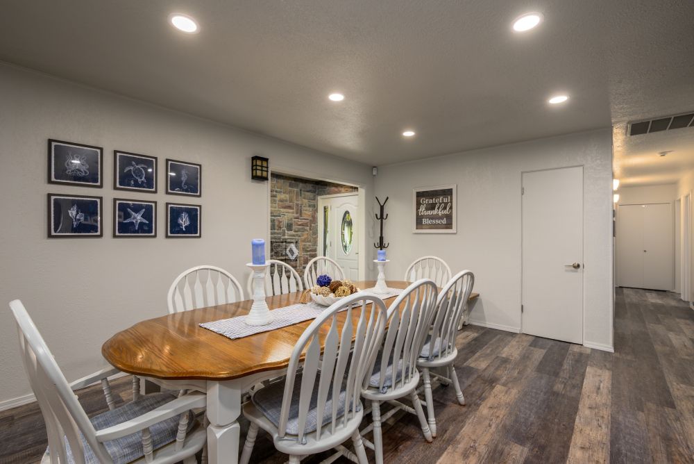 A photo of the dining room, entrance and hallway
