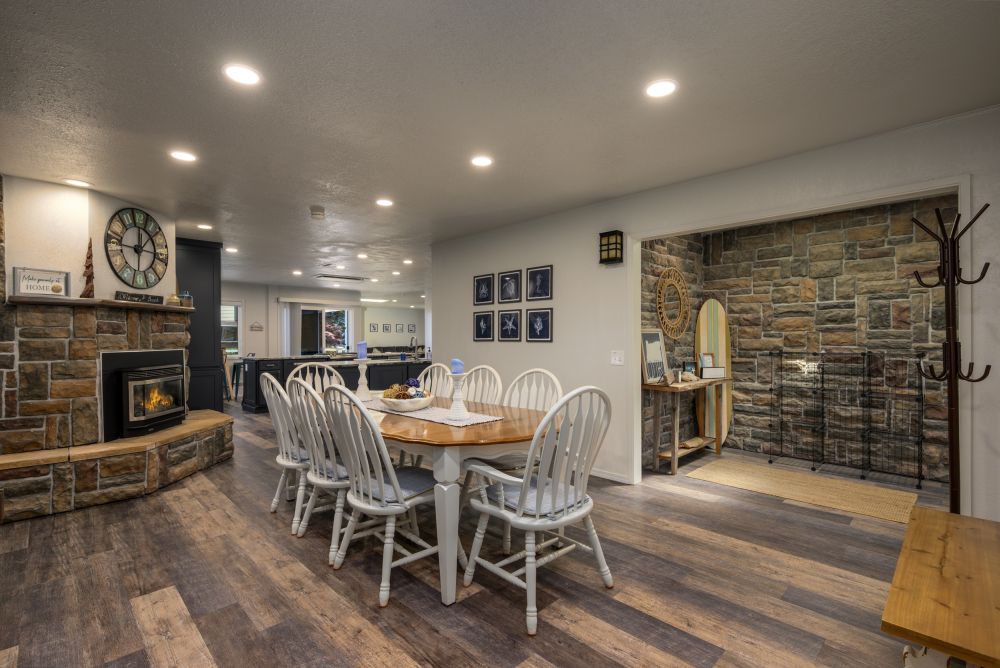 A photo of the kitchen and dining with two sided fireplace
